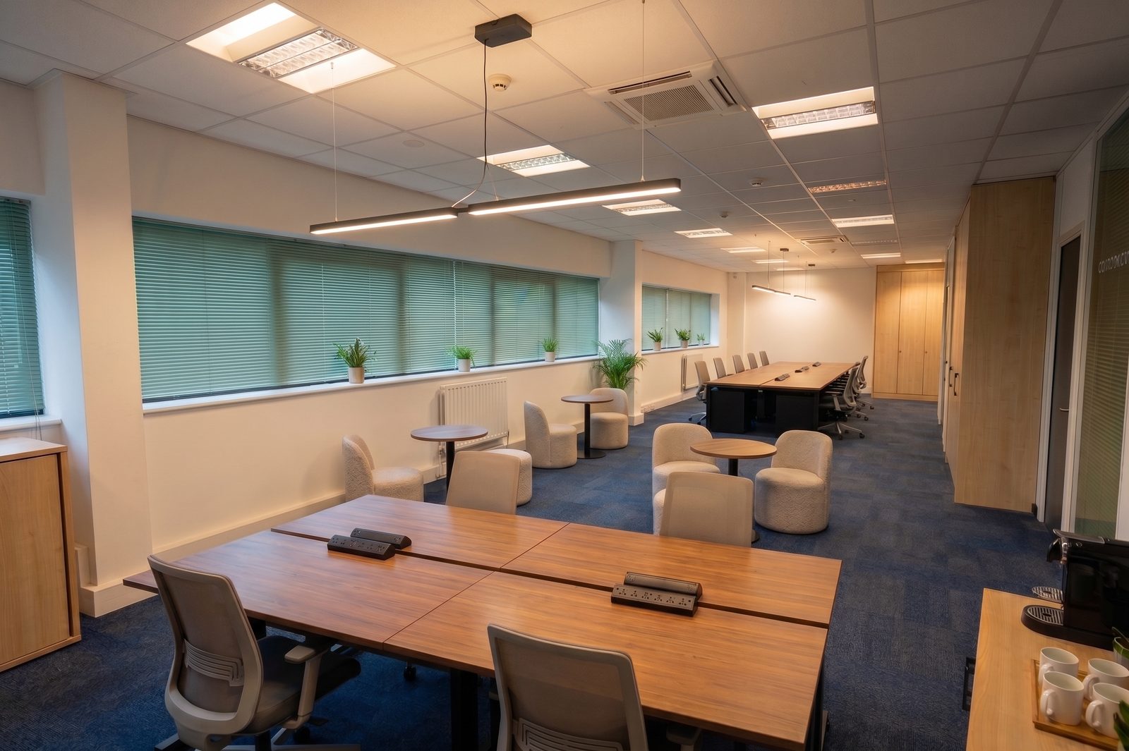 Client office and dedicated working stations upstairs at the Rainham warehouse